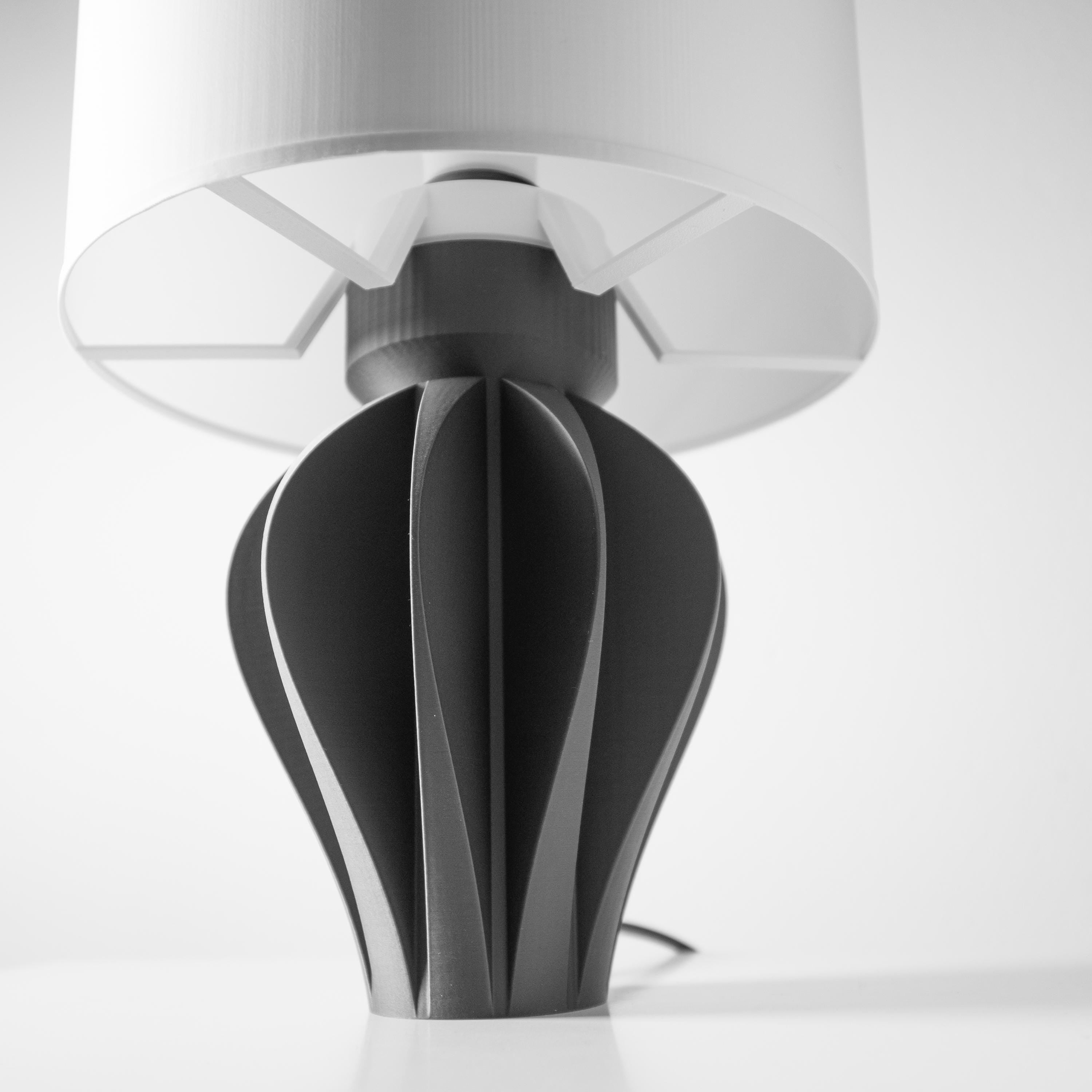 AKANI Lamp – Sculptural 3D Printed Table Lamp, Ambient Bedside Light, Matte Black PLA (etsy image id: 7912970487)